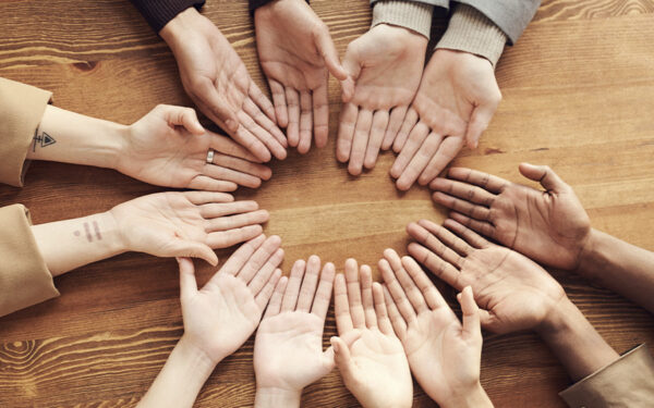 A hand circle representing how joining a single moms support group in Baltimore can help you find the connection and understanding you've been searching for.