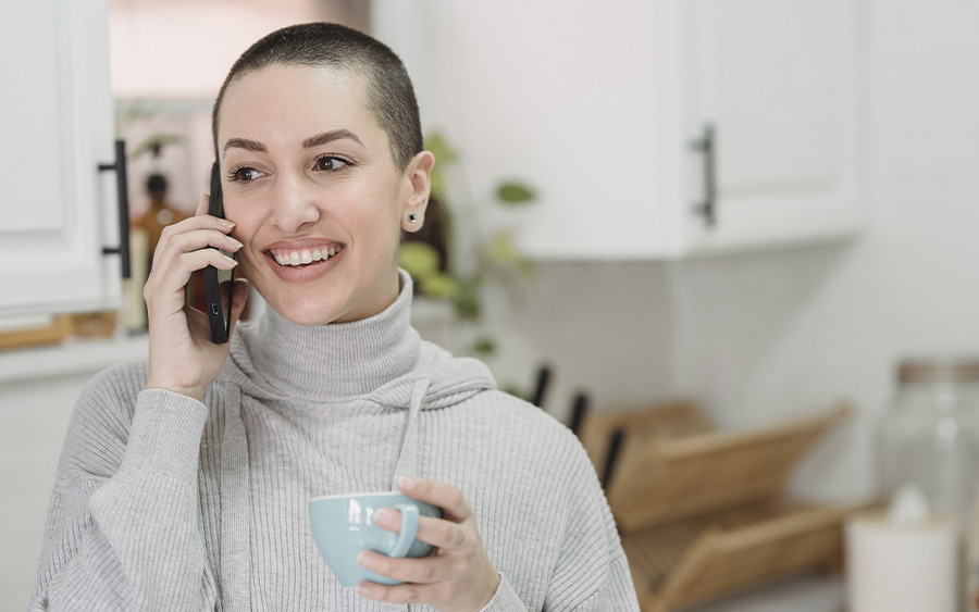 Woman calling to schedule her first therapy appointment. This represents how our therapists in Baltimore can help you address your fears about starting therapy and take the first step towards a healthier and happier life.