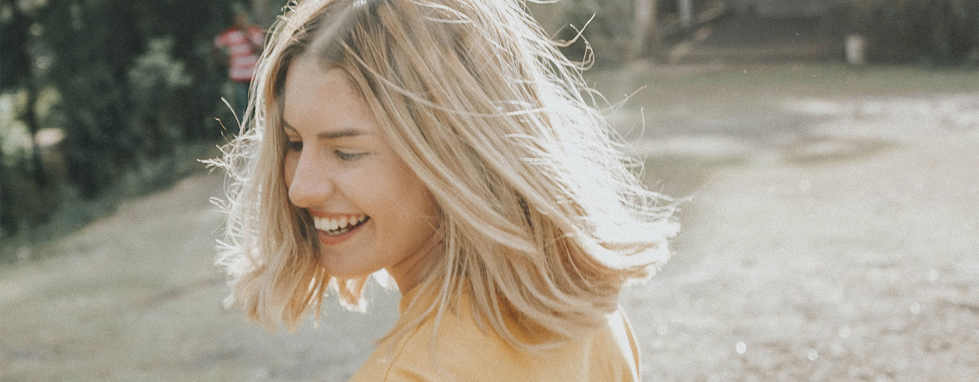 Photo of a woman with a happy and light expression. This represents how finding a anxiety therapist in Baltimore can help you feel better and learn new ways to cope with the challenges in your life.