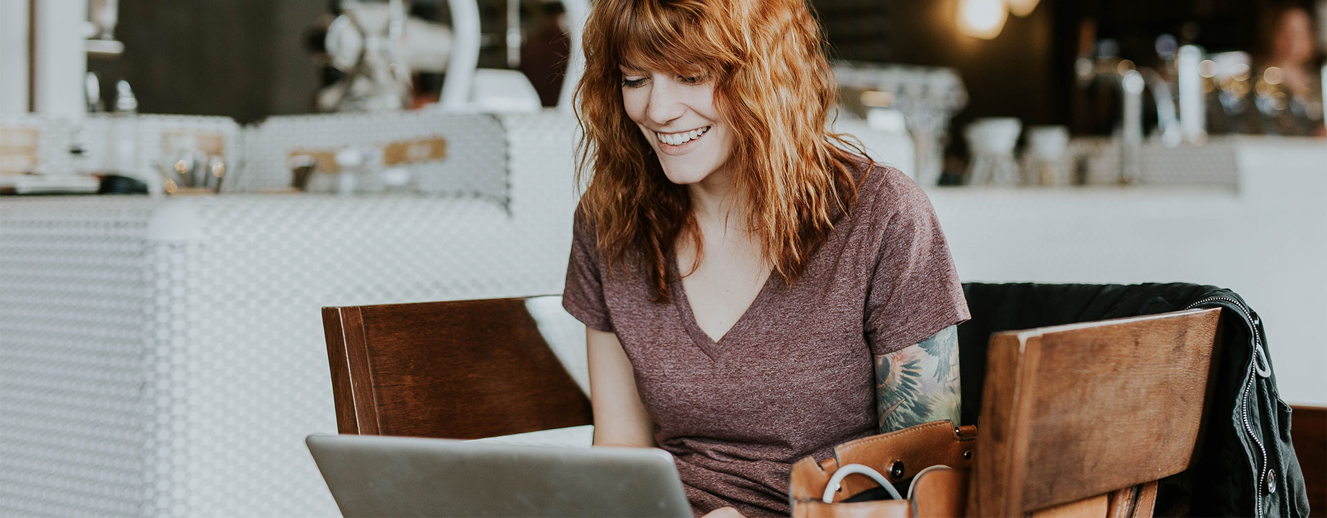 Photo of a woman having a virtual session on her laptop. This represents how can get help for your mental health issues from whatever your are in Maryland.