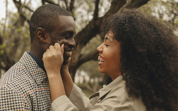 Couple having a happy and fun moment together. This represents how you can build stronger and more fulfilling relationships if you actively work toward making changes in your life.